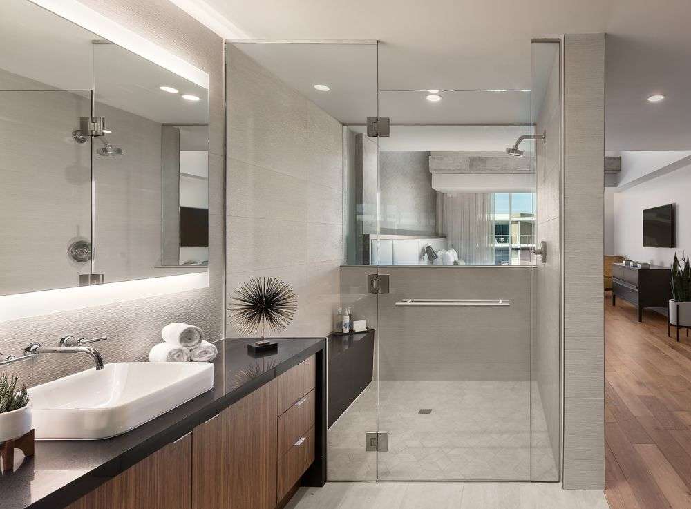 a bathroom with a shower and decorations