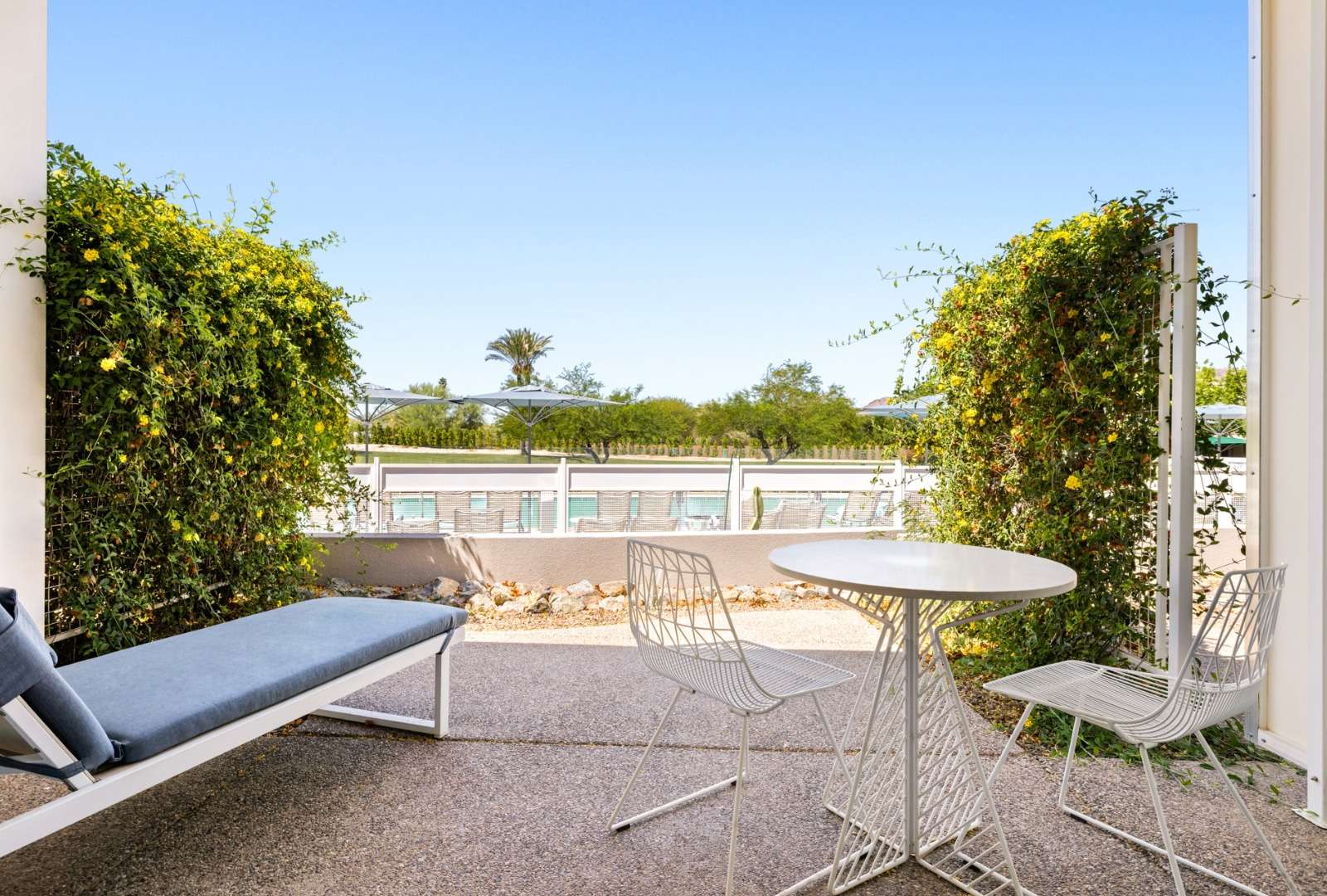 Cabana Premium Guestroom Patio facing Sunset Pool